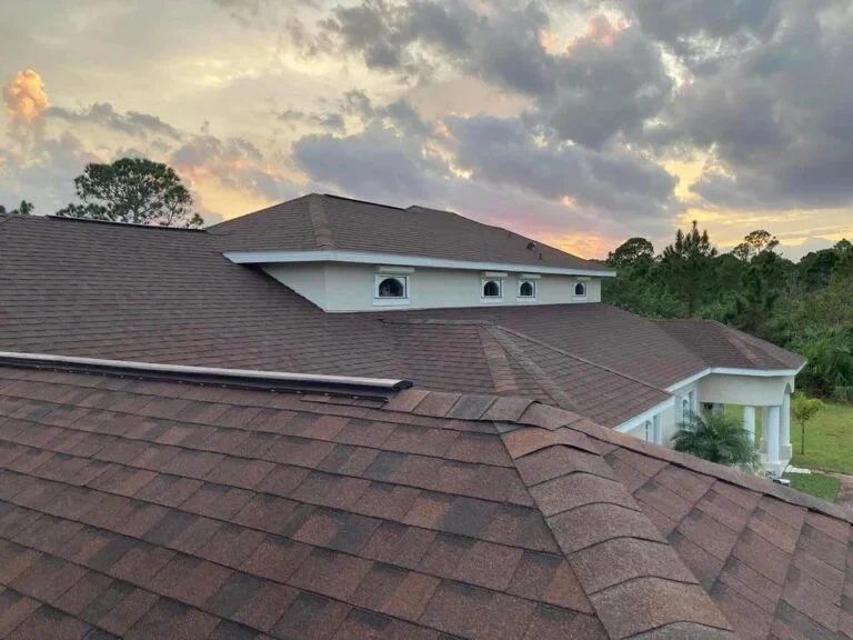Finished architectural shingle roof at sunset